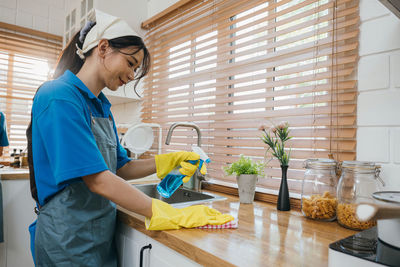 Side view of man working at home