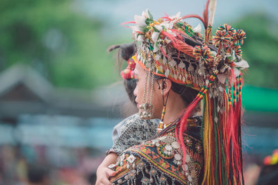 Close-up of man dancing against blurred background