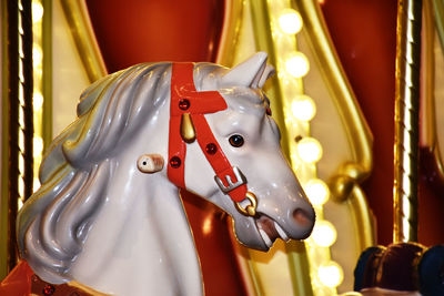 Close-up of horse sculpture in amusement park