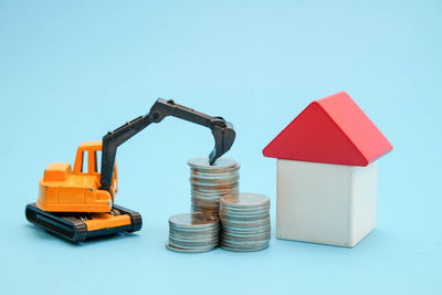 Close-up of toys against blue background