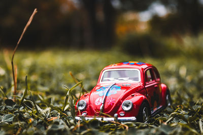 Close-up of toy car on field