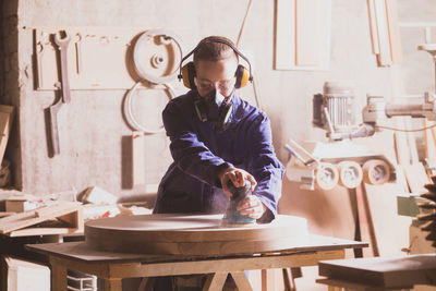 Female worker working at workshop