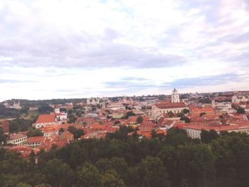 High angle view of townscape against cloudy sky