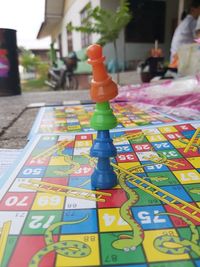 Close-up of stuffed toy on chess board