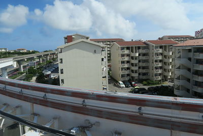 High angle view of buildings against sky in city