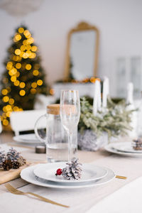 Christmas, holidays and eating concept - table served for festive dinner at home