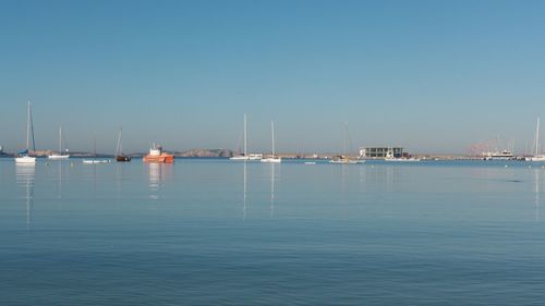 Scenic view of sea against clear blue sky