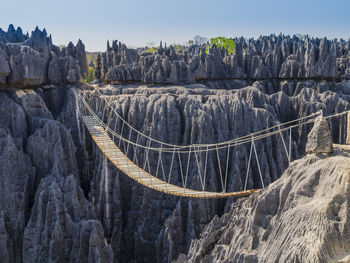 Footbridge hanging on mountains