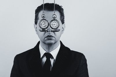 Portrait of man against white background