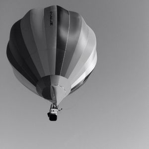 Low angle view of hot air balloon flying in sky