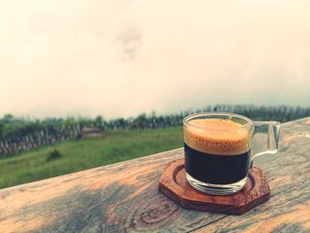 Close-up of coffee cup on table