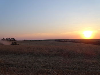 Scenic view of land during sunset