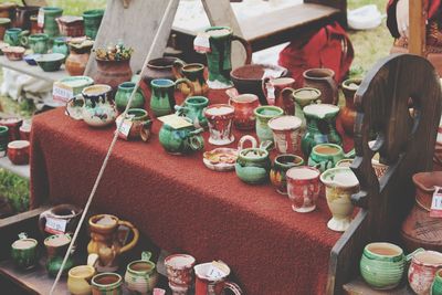 High angle view of ceramics for sale at market stall