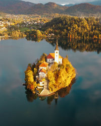 High angle view of townscape by lake