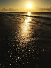 Scenic view of sea against sky at sunset
