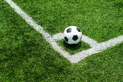 High angle view of soccer ball on field