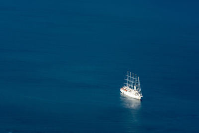 High angle view of sailboat sailing in sea