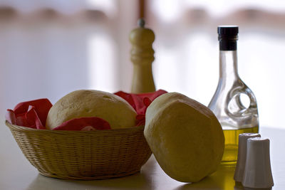 Close-up of fruits in basket on table