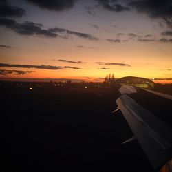 Scenic view of landscape against sky at sunset