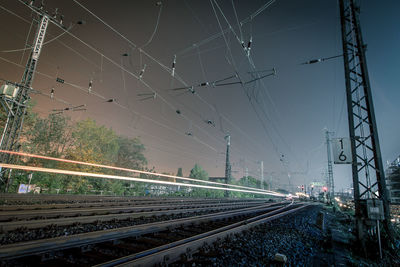 Railroad tracks against clear sky