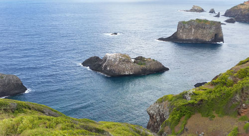 High angle view of rocks in sea