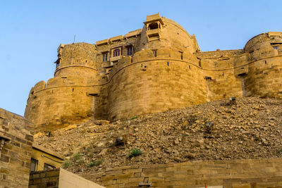 Low angle view of historic building against sky