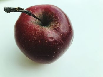 Close-up of apple against white background