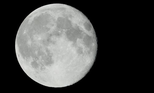 Low angle view of moon in sky