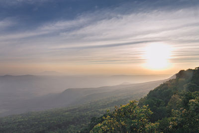 Scenic view of landscape against sky during sunset