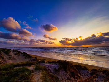 Scenic view of sea against sky during sunset