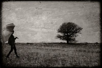 Woman standing on field