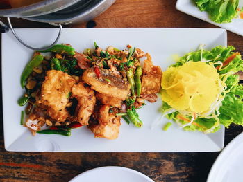 High angle view of meal served on table