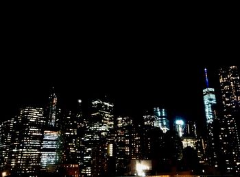 Illuminated cityscape at night