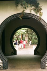 People in corridor of building