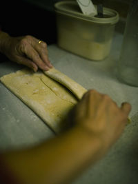 Close-up of man preparing food