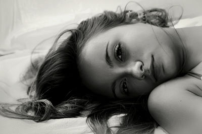 Baby sleeping on bed at home