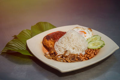 Close-up of food served on table