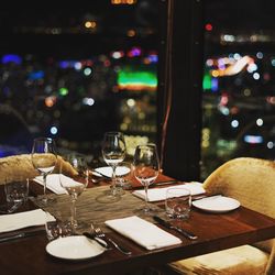 View of wine glasses on table at restaurant