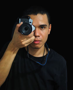 Portrait of man photographing