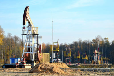 Construction site on field against sky