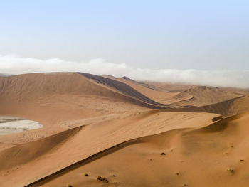 Scenic view of desert against sky