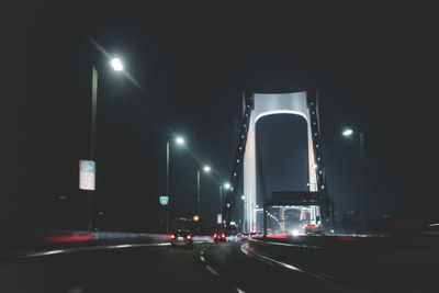 Cars on road at night