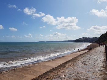 Scenic view of beach against sky in dawlish, united kingdom