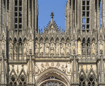 Detail of the reims cathedral in reims, the most populous city in the french department of marne