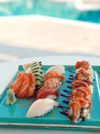 Close-up of sushi served on table