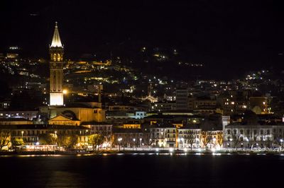 Illuminated buildings in city at night