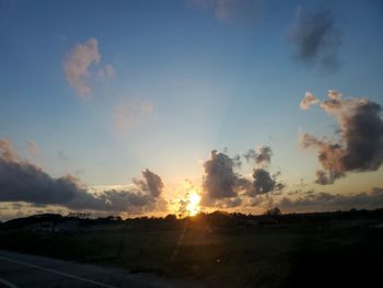 Silhouette landscape against sky during sunset