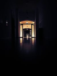 Illuminated corridor of building