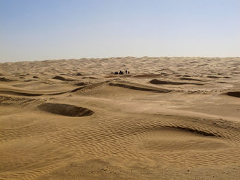 Scenic view of desert against clear sky