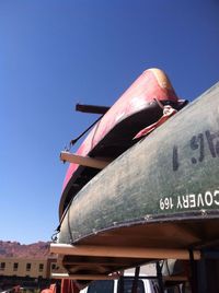 Low angle view of built structure against clear blue sky